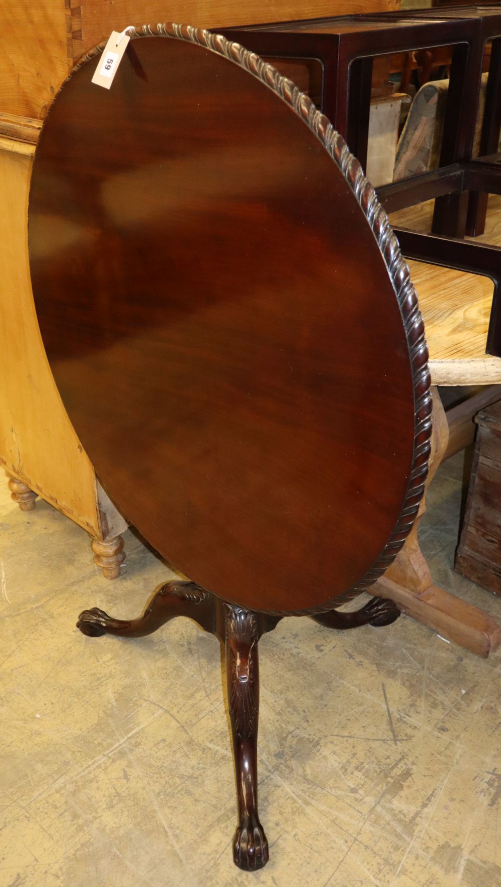 A George III mahogany bird cage tilt top tea table, diameter 88cm, H.72cm